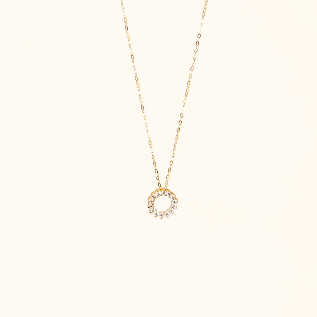 Gold circle hot sale charm necklace